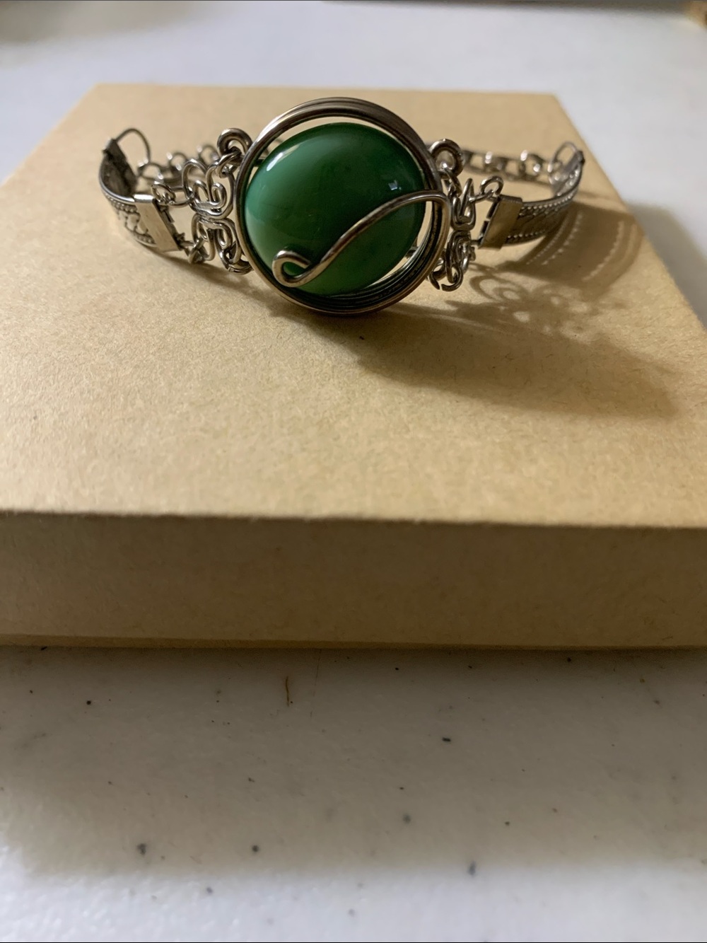 Silver-Tone Bracelet with Green Cabochon Accent